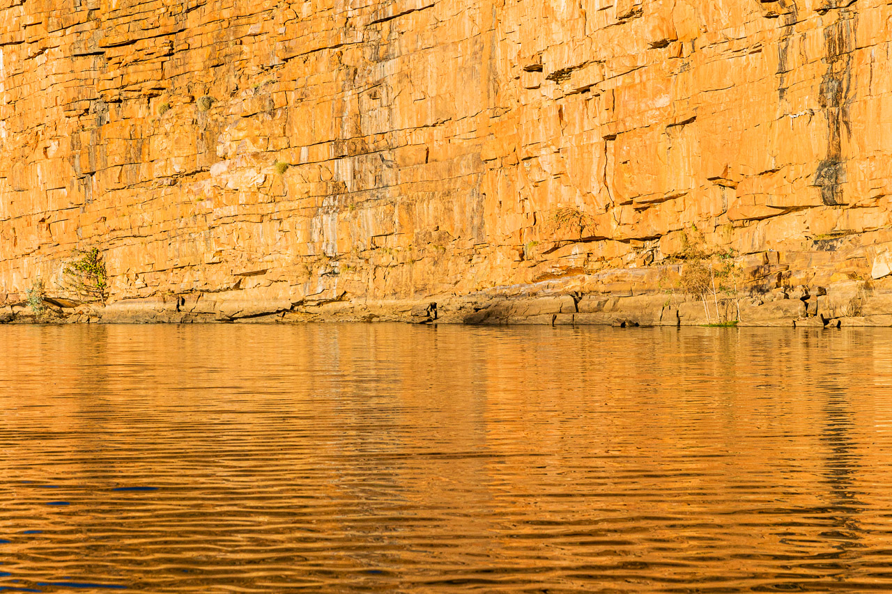 Golden reflections in the late afternoon sun at Chamberlain Gorge, El Questro in WA's Kimberley