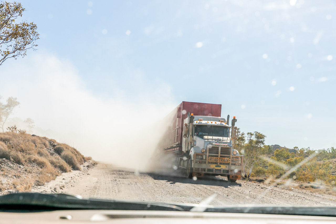 Passing a road train on a dirt road makes visibility impossible with the clouds of dust