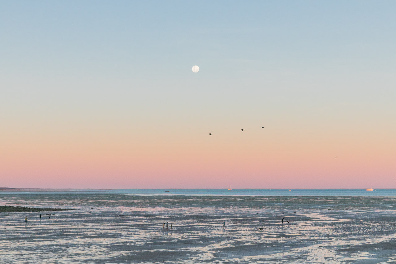 Evening strolls at low tide in the gentle evening light at Town Beach in Broome