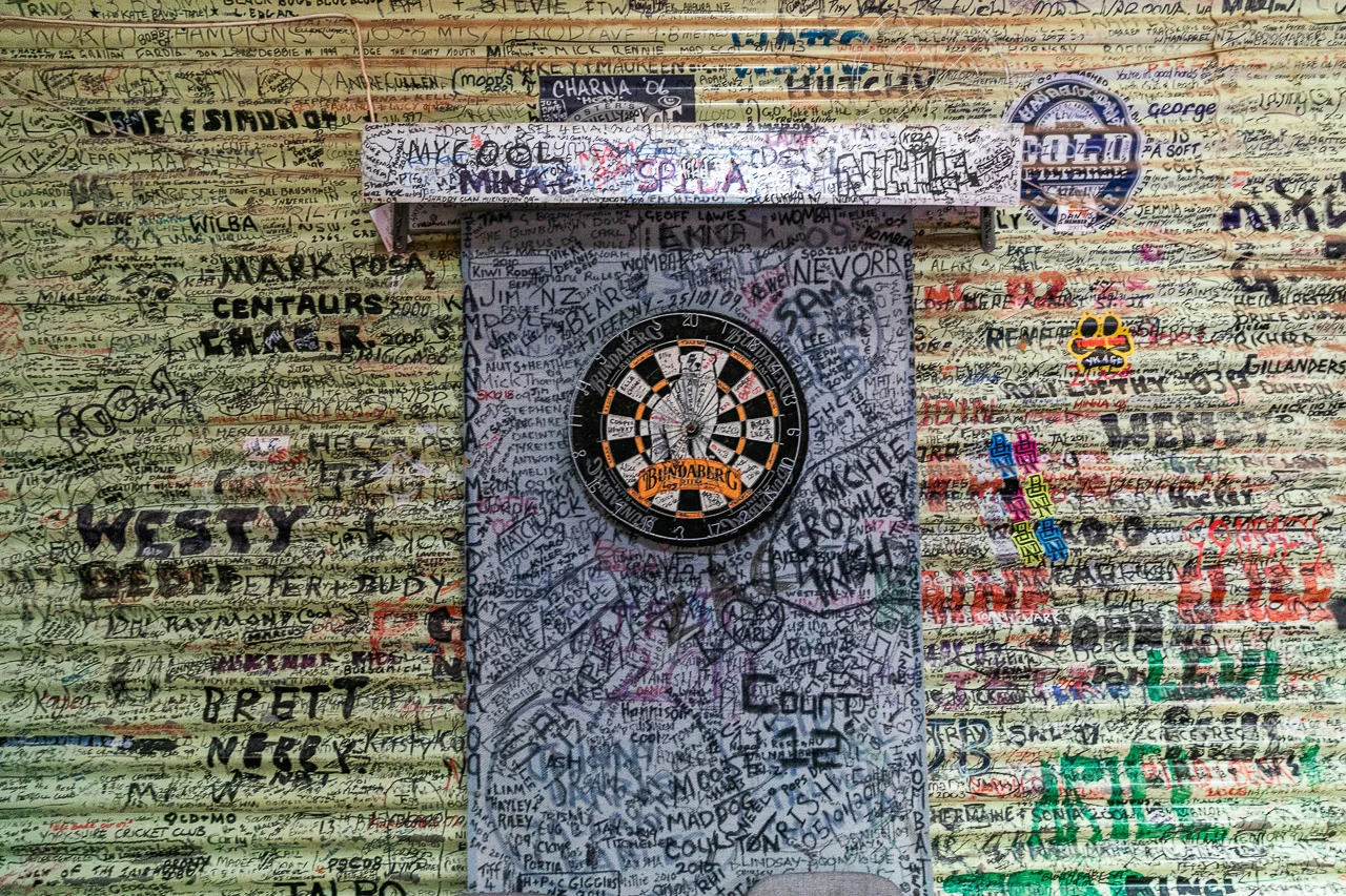 Even the dartboard at the Broad Arrow Tavern has graffiti