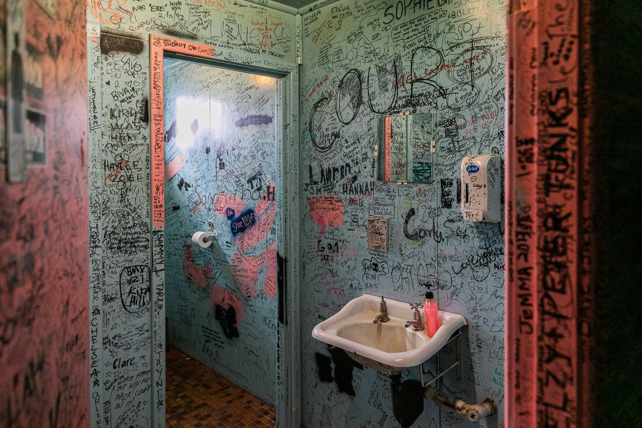 The toilets have not escaped the graffiti at the Broad Arrow Tavern