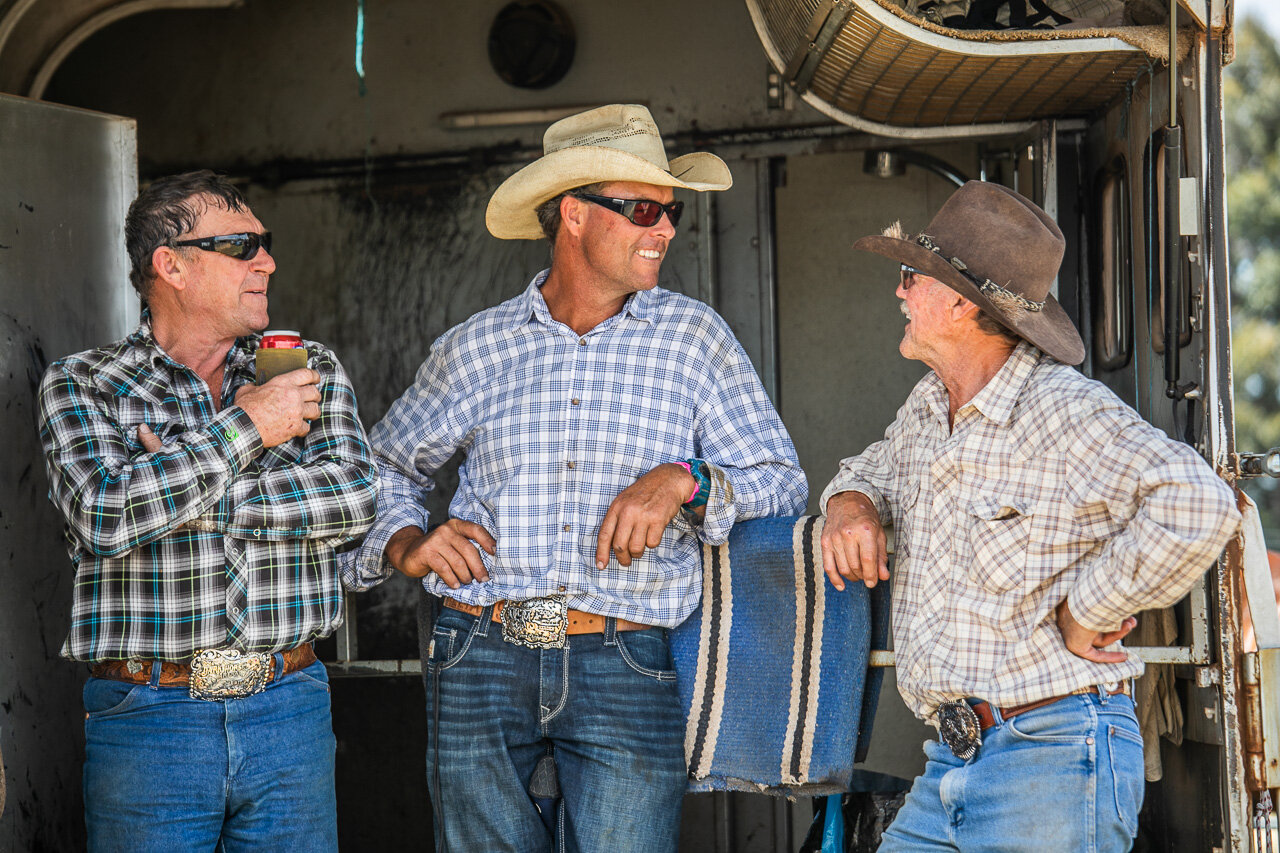 Cowboys catching up in the back of the horse trailer at Boyup Brook Rodeo