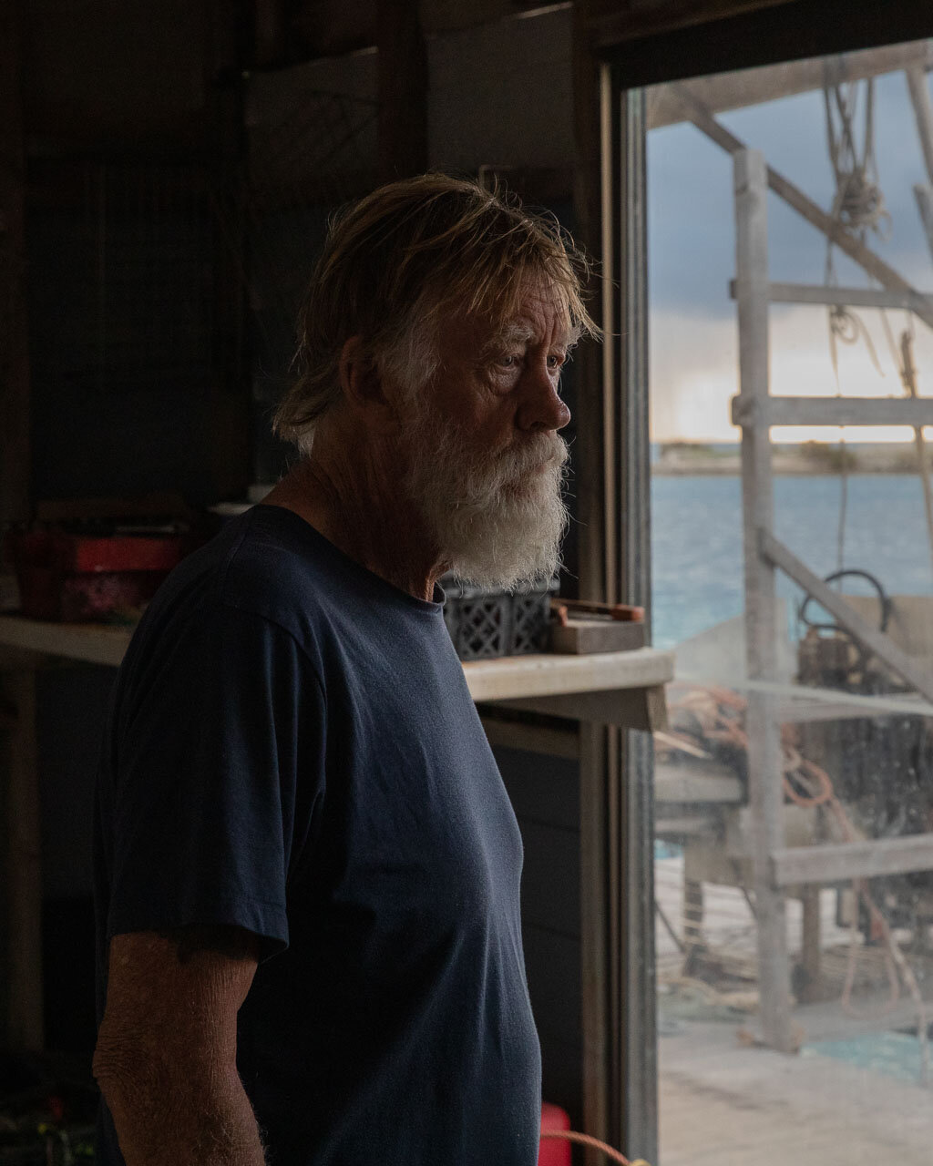 Abrolhos island pearl farmer in the doorway of the shed