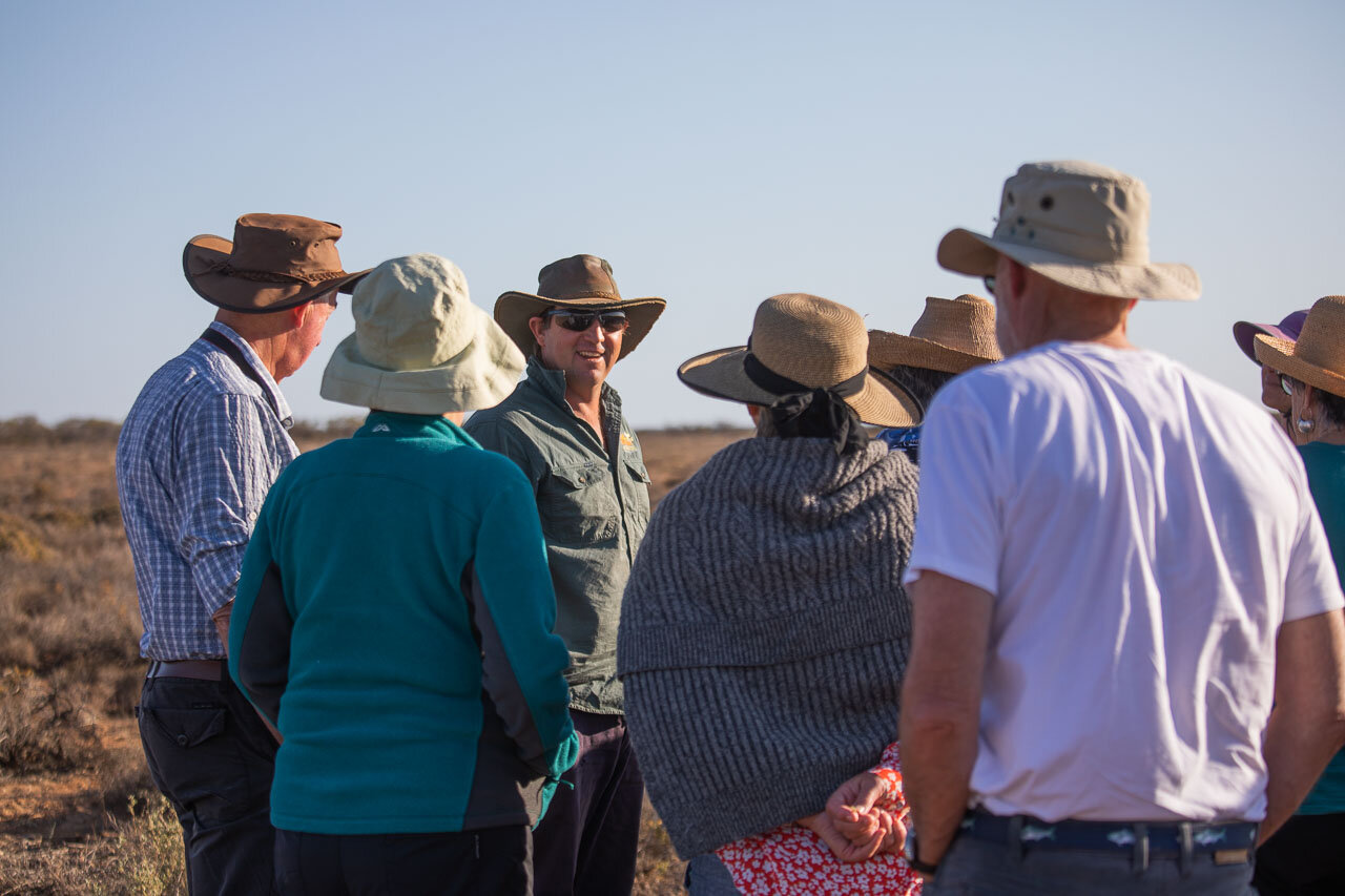 Pastoralist and tourism operator, David Pollock shows the revegetation during the sunset tour of Wooleen Station