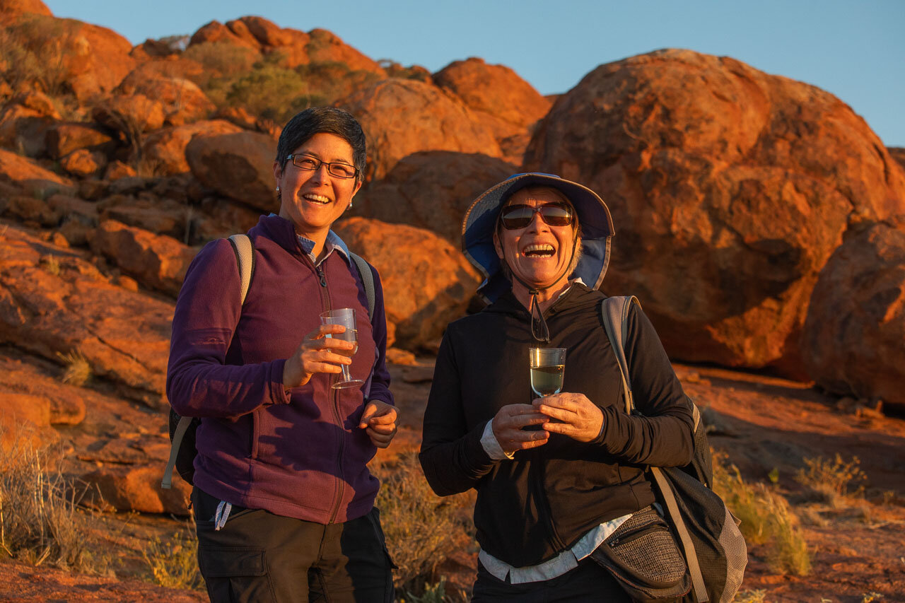 Happy guests at Wooleen Station, enjoying a wine on the sunset tour.