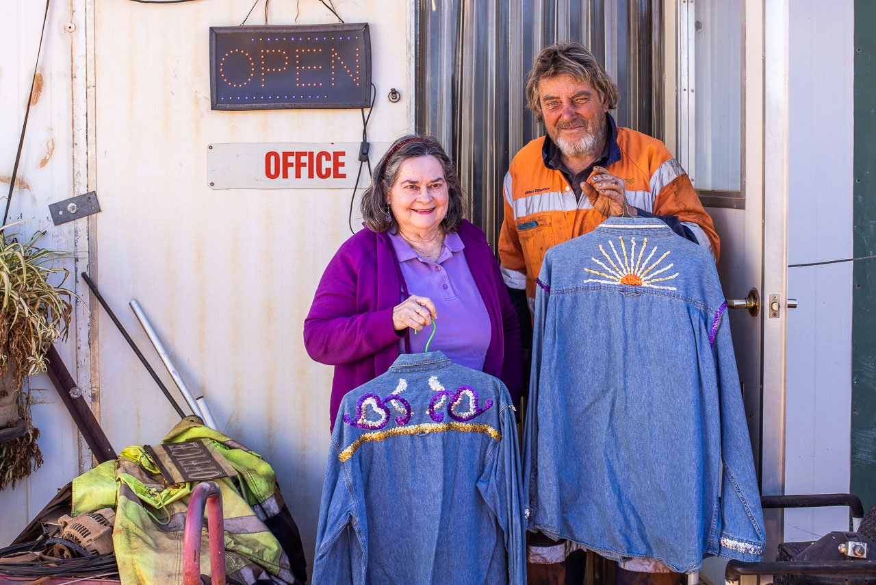 Jean and Russell Lutz show off their wedding outfits which Jean had customised herself.