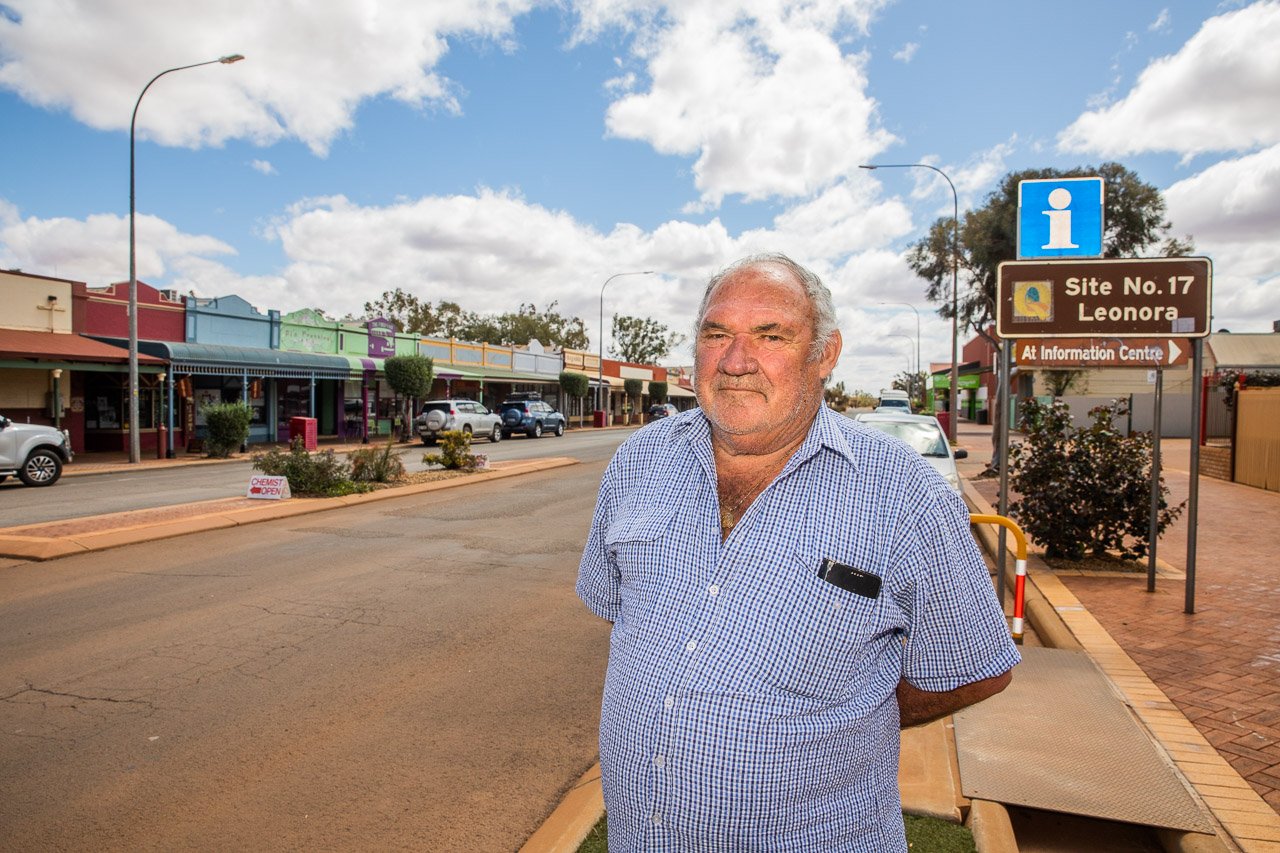 Painter Terry Demasson in the main street of Leonora in the northern Goldfields