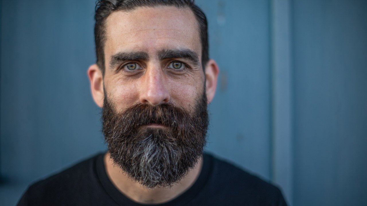 Portrait of Drew Goddard, the guitarist and founding member of Karnivool