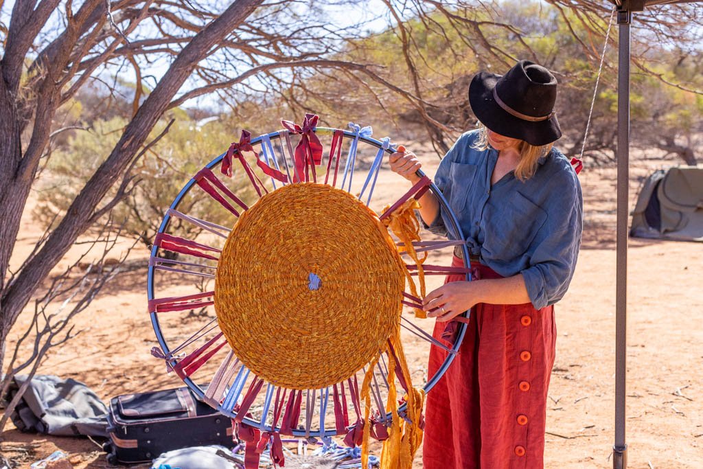 Artist in residence Lucy Ridsdale at the Reclaim the Void camp near Leonora