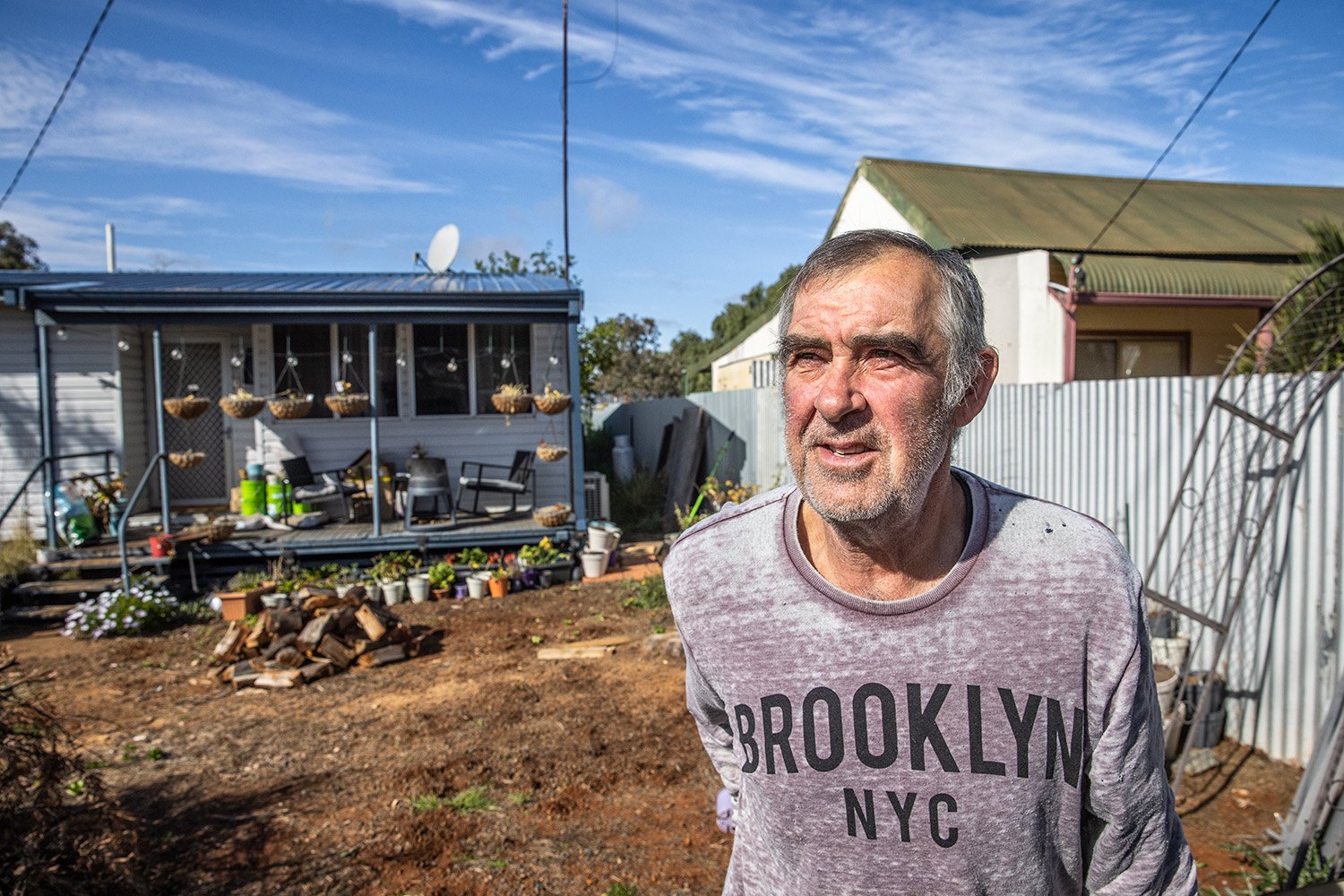 Man outside his house in the Goldfields