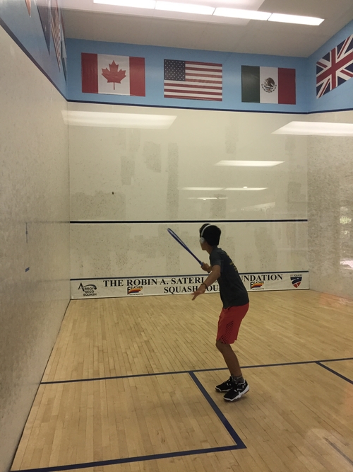 Eric Lin warming up before his match against Vishal Prashant