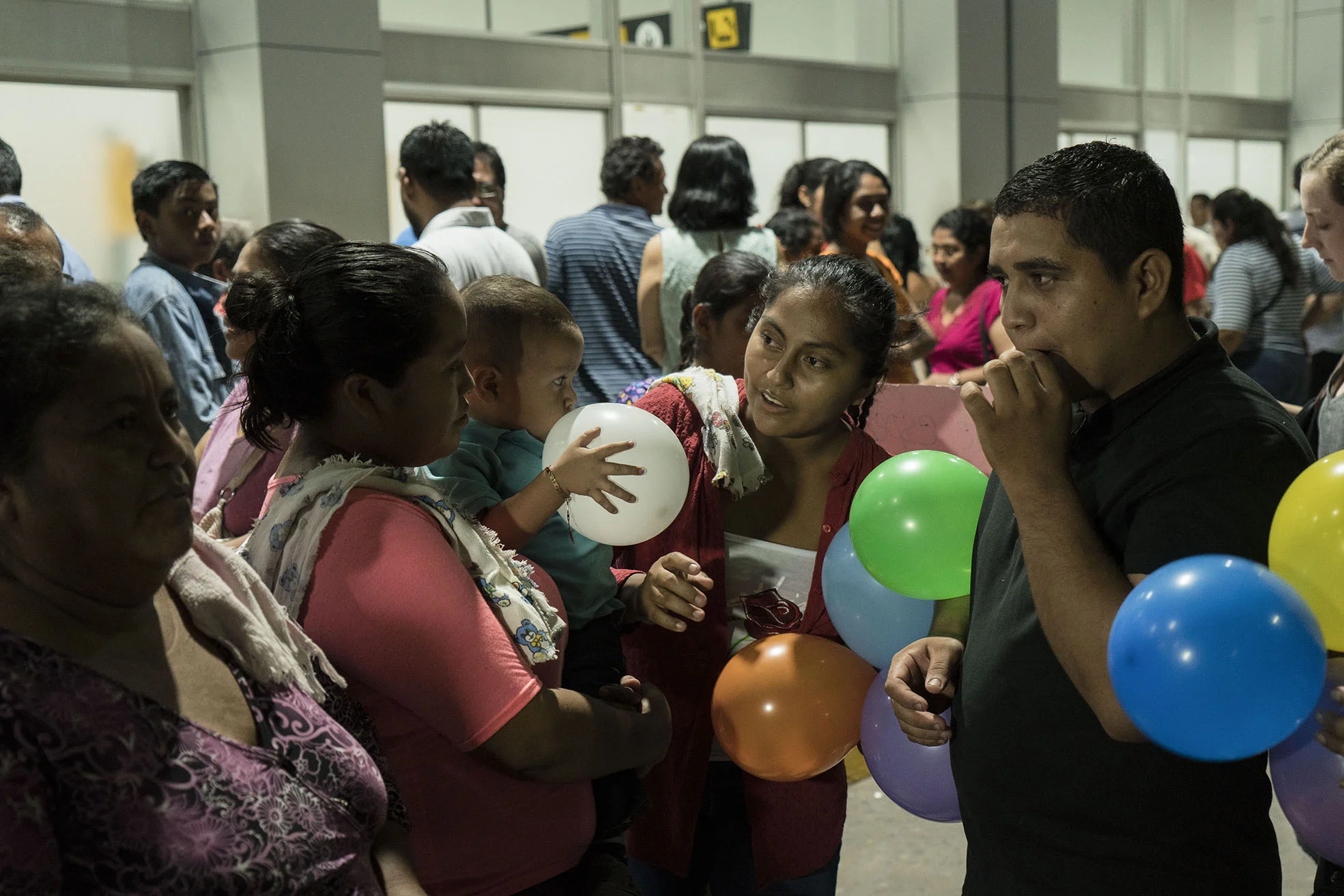 Relatives outside the airport in El Salvador wait for 6-year old daughter Meybelin who was separated from her father Guidos Portillo at the US border a month ago. On June 21, Portillo was deported without Meybelin. Father and daughter were reunited on June 28, 2018.