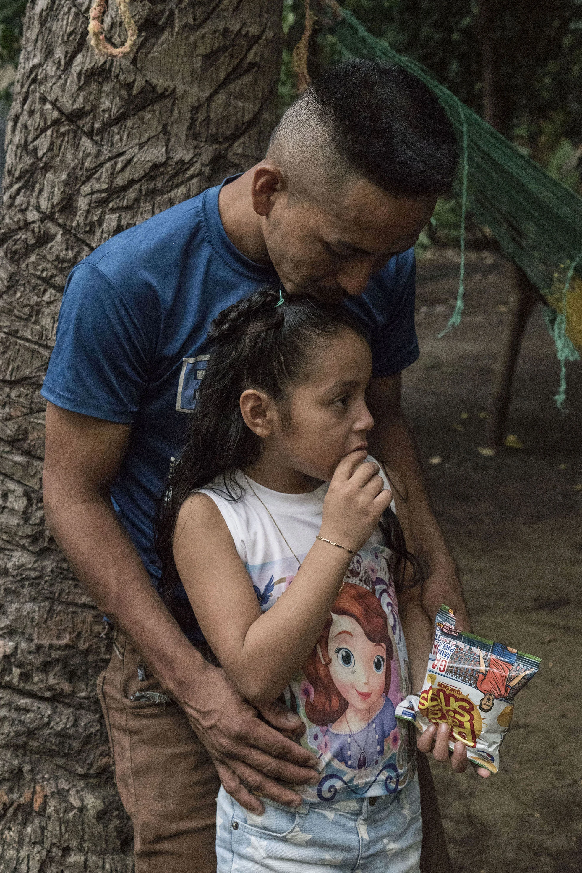 Arnovis Guidos Portillo with his 6-year old daughter, Meybelin.