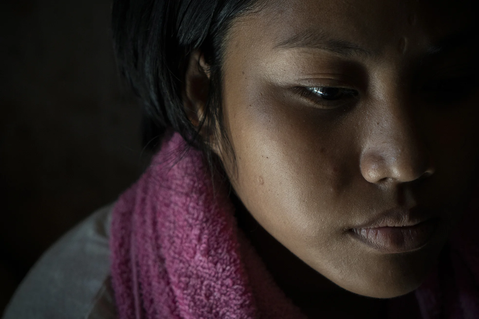 Zia, 19, poses for a portrait inside her home in Manila on October 23, 2018. She had a backdoor abortion when she was 14. It sent her to a hospital after 2 weeks of profuse bleeding.
Photo by Kimberly dela Cruz