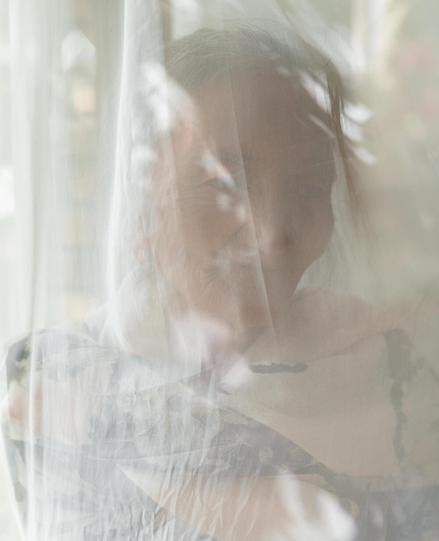 A great photo doesn&rsquo;t just show you what is happening, but helps you understand. 

Maria stands behind a curtain for a portrait during a grief counseling retreat in Tagaytay City in the Philippines on February 23, 2020. Maria&rsquo;s grandson A