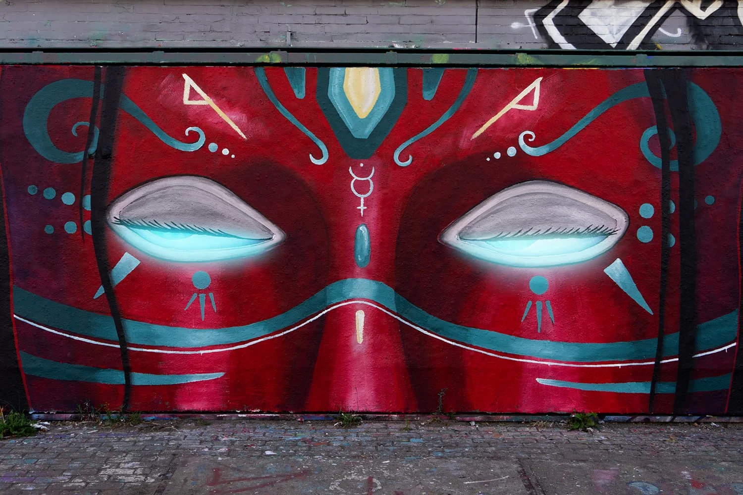 Eyes painted in a wall by the artist Skount