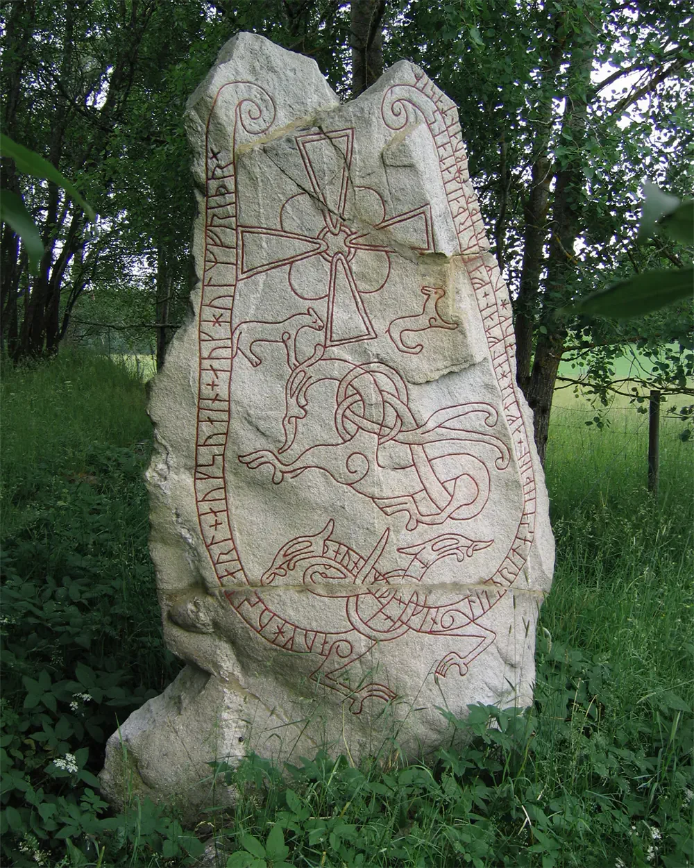 Runic carving on the Lingsberg Runestone in Sweden featuring Viking Age inscriptions carved into granite.