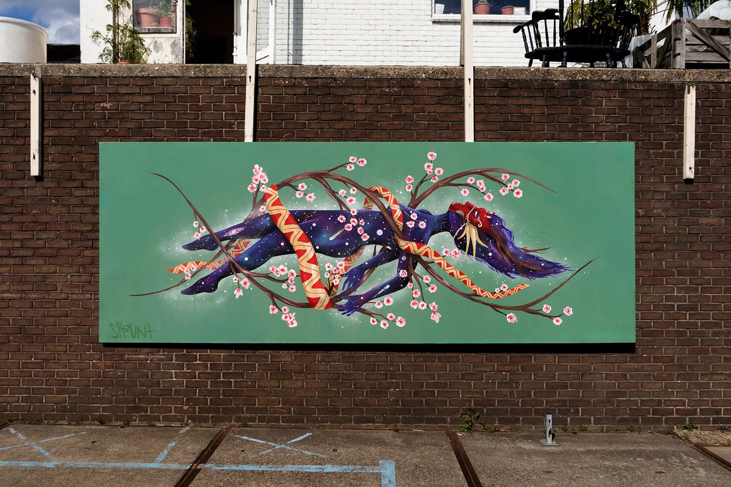 Helix mural by Skount in Amsterdam, full view of the large-scale public artwork exploring resilience and transformation through the spiral form