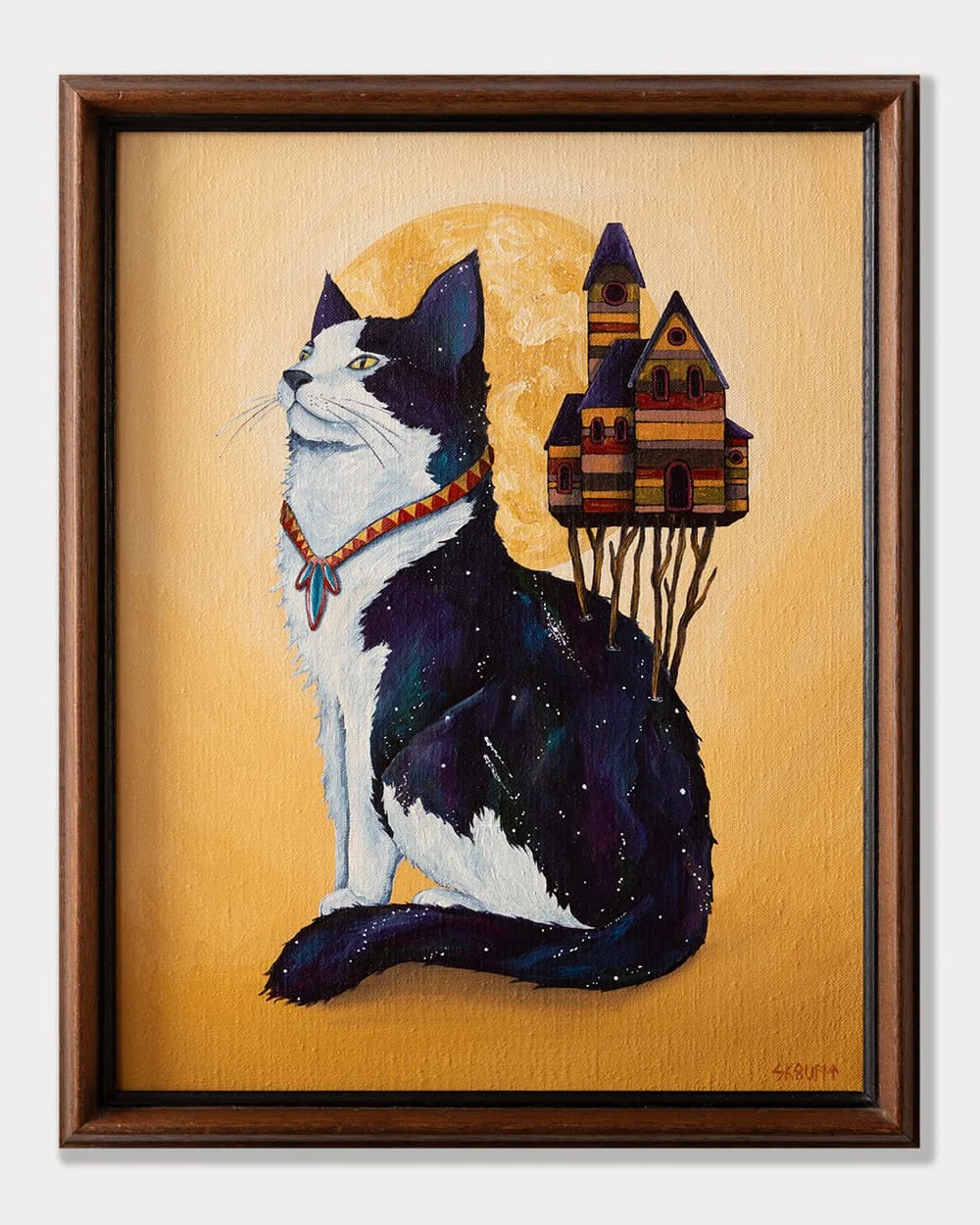 Framed symbolic cosmic cat artwork The Keeper by Skount displayed on wall