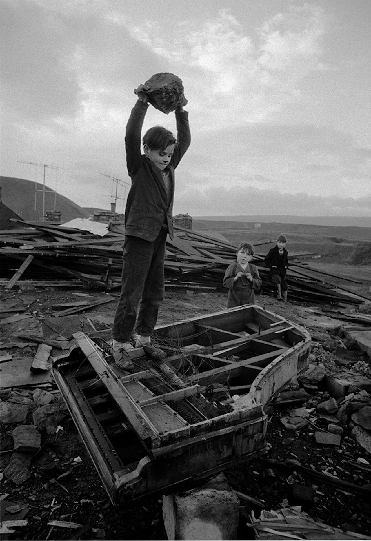 Boy Destroying Piano, Wales, 1961 © Philip Jones Griffiths / Magnum Photos