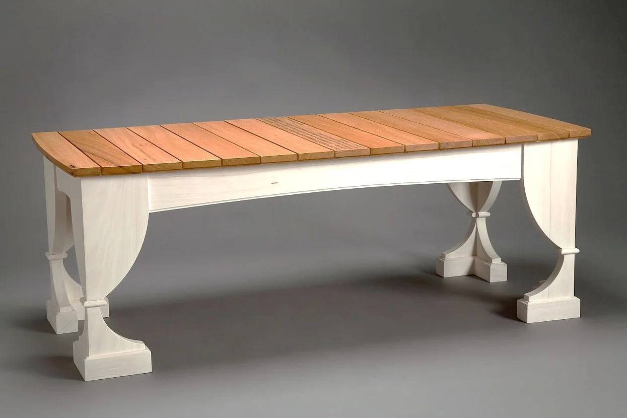 " SlaveBench " by Dale Broholm Wood Bench made in collaboration with Dan Cavicchi for donation to Hampton National Historic Site Friends Group. Made from pecan wood from the Site for use in the Witness Tree Project, which we co-teach at Rhode Island School of Design. Laser cut lettering in top is text from a run away slave announcement in the Baltimore Sun newspaper from the mid 1800s. Bleached pecan, Pecan. Lacquer finish.