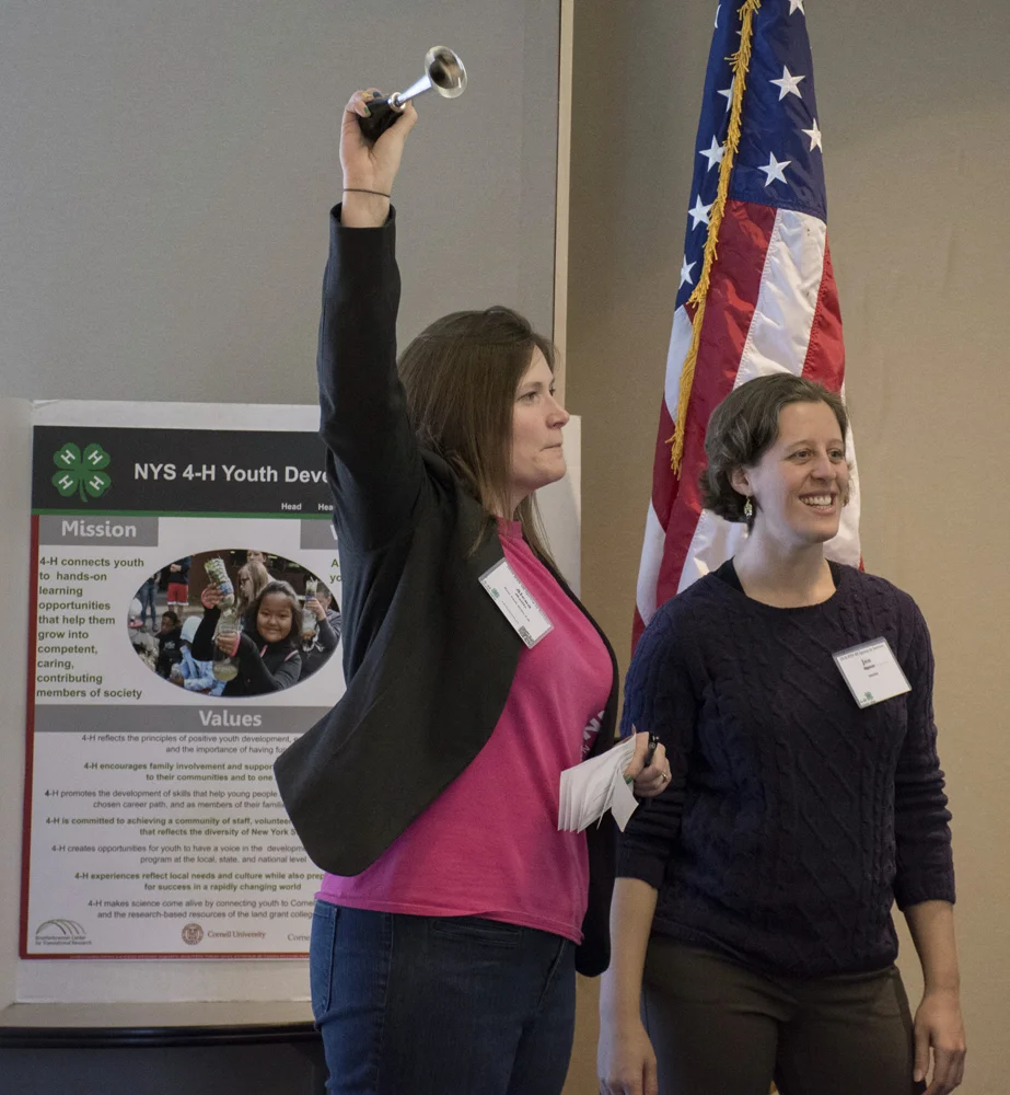 Alexa Maille (4-H) and Jennifer Agans (PRYDE) co-leading an exercise at an event