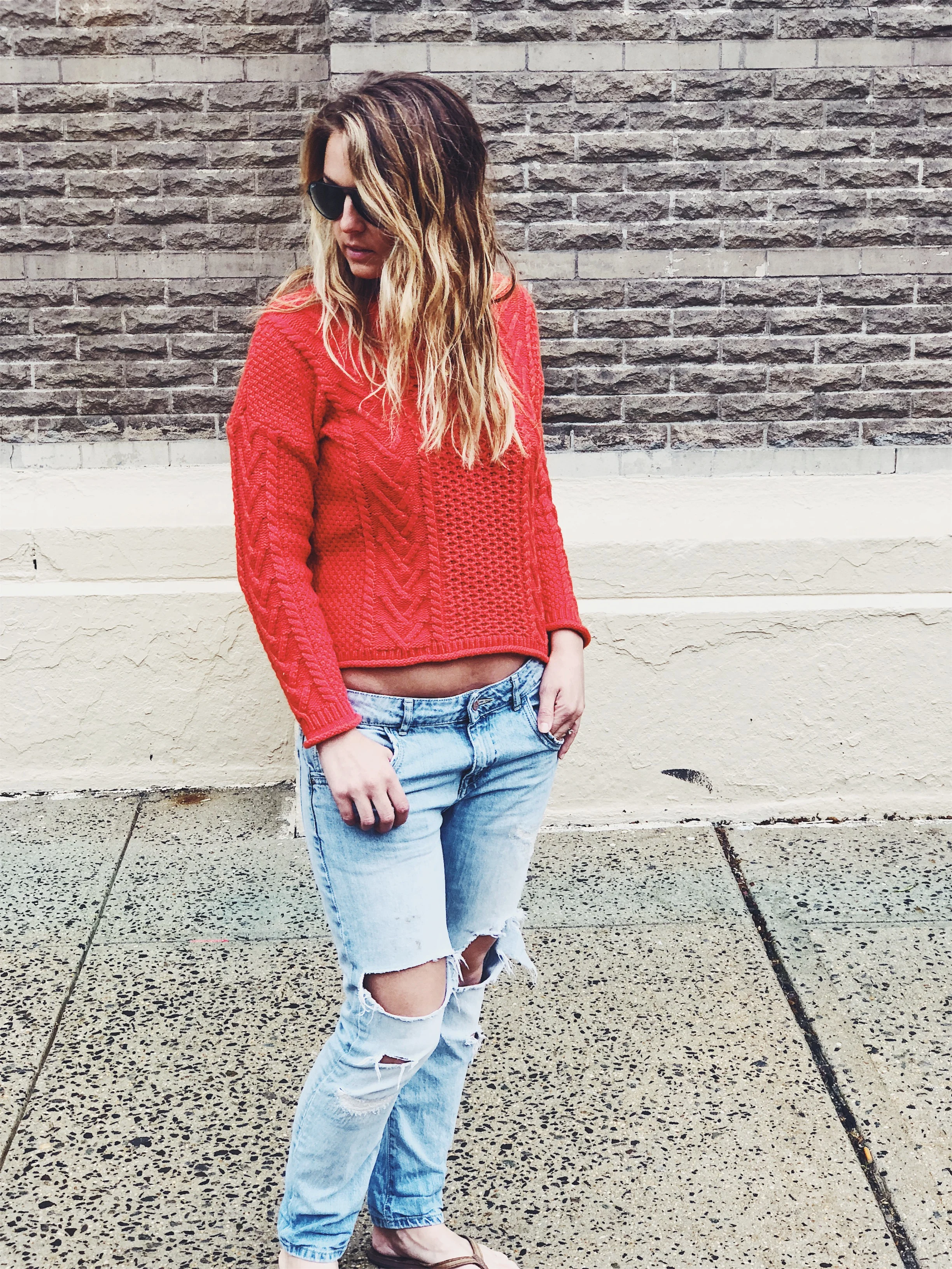 ripped jeans and sweater