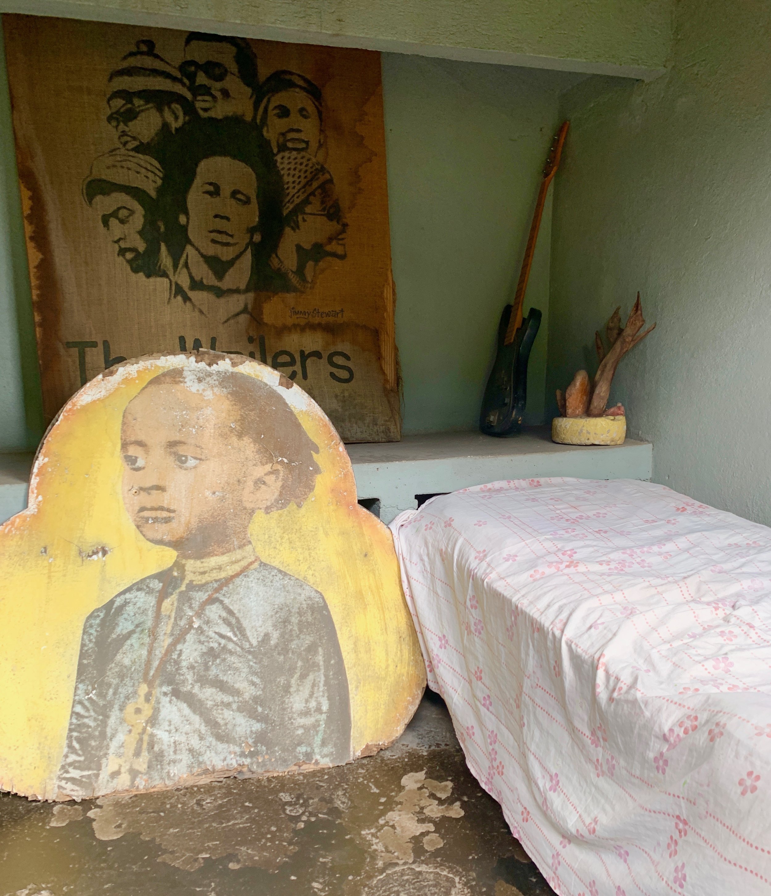  Remember how Bob Marley sings “Cold ground was my bed last night” in Talkin’ Blues? This was his room in the yard at Trench Yown, with the twin bed where his wife, Rita, and their child slept  – and the “cold ground” that doubled as his bed. 