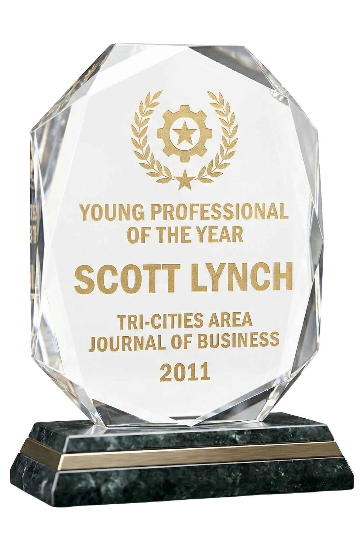 A crystal award with gold lettering recognizing Scott Lynch as Young Professional of the Year in 2011 from Tri-Cities Area Journal of Business.