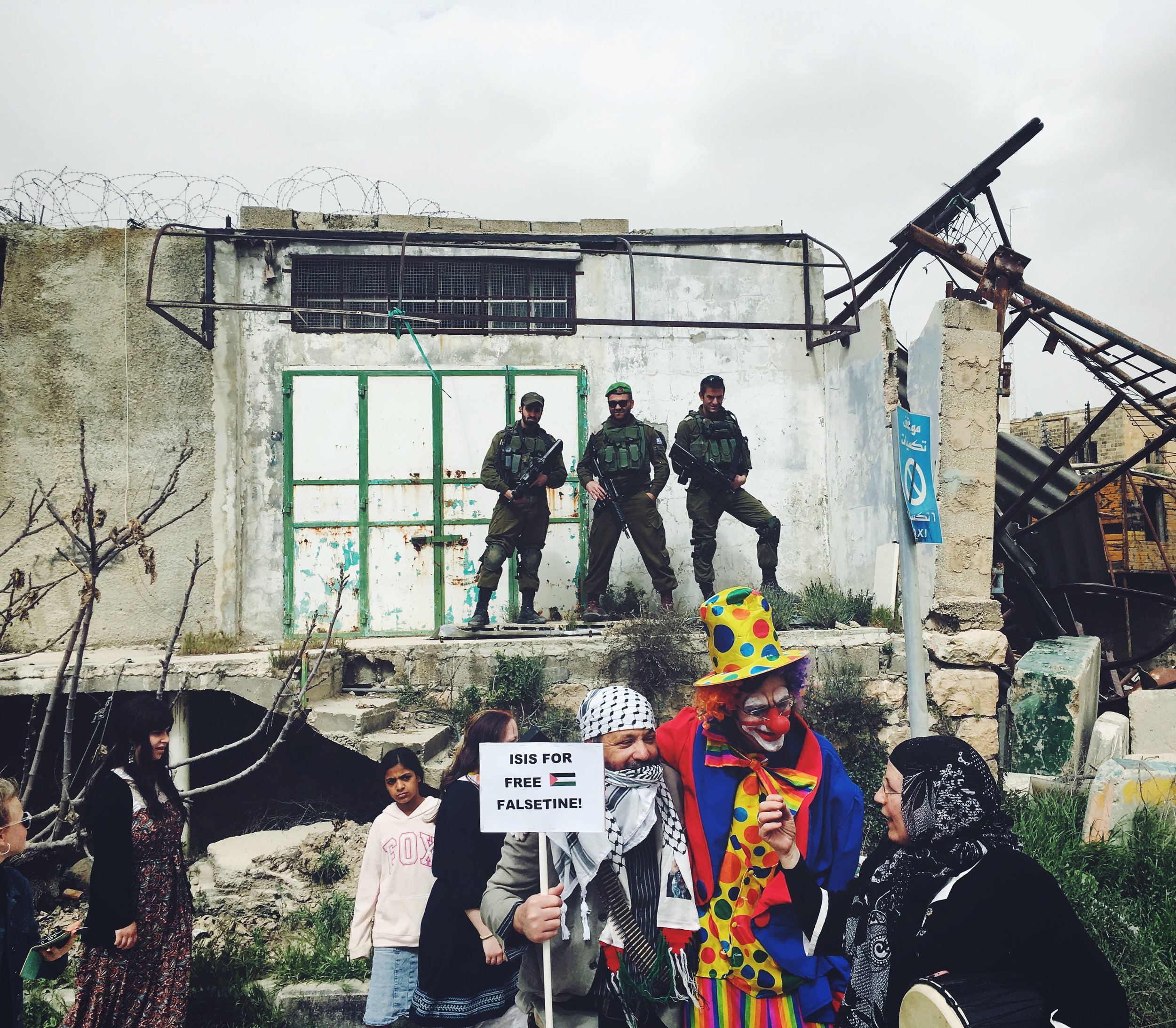  A fringe group of settlers in the West Bank city of Hebrom celebrating Purim.&nbsp;&nbsp;Costumes from left to right: terrorist, clown and "Palestinian woman." 