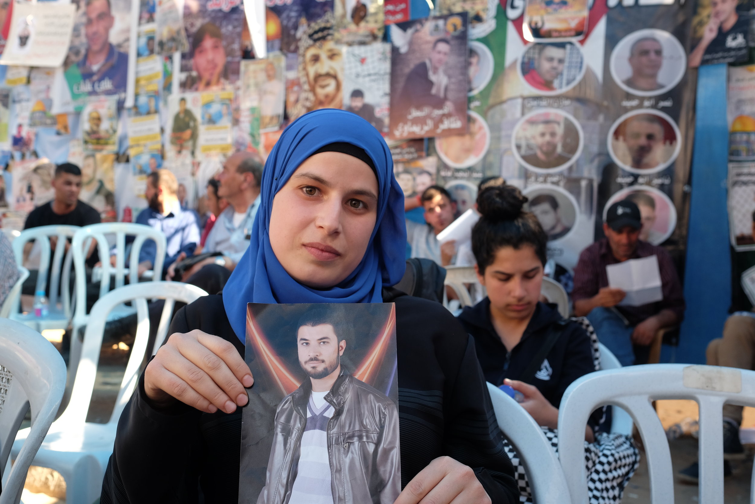  Haneen,&nbsp;in the Ramallah tent for family members of Palestinian prisoners on hunger strike. "Everyone I know has a family member in jail or who was killed," she says. Published by Women in the World in association with The New York Times.&nbsp; 