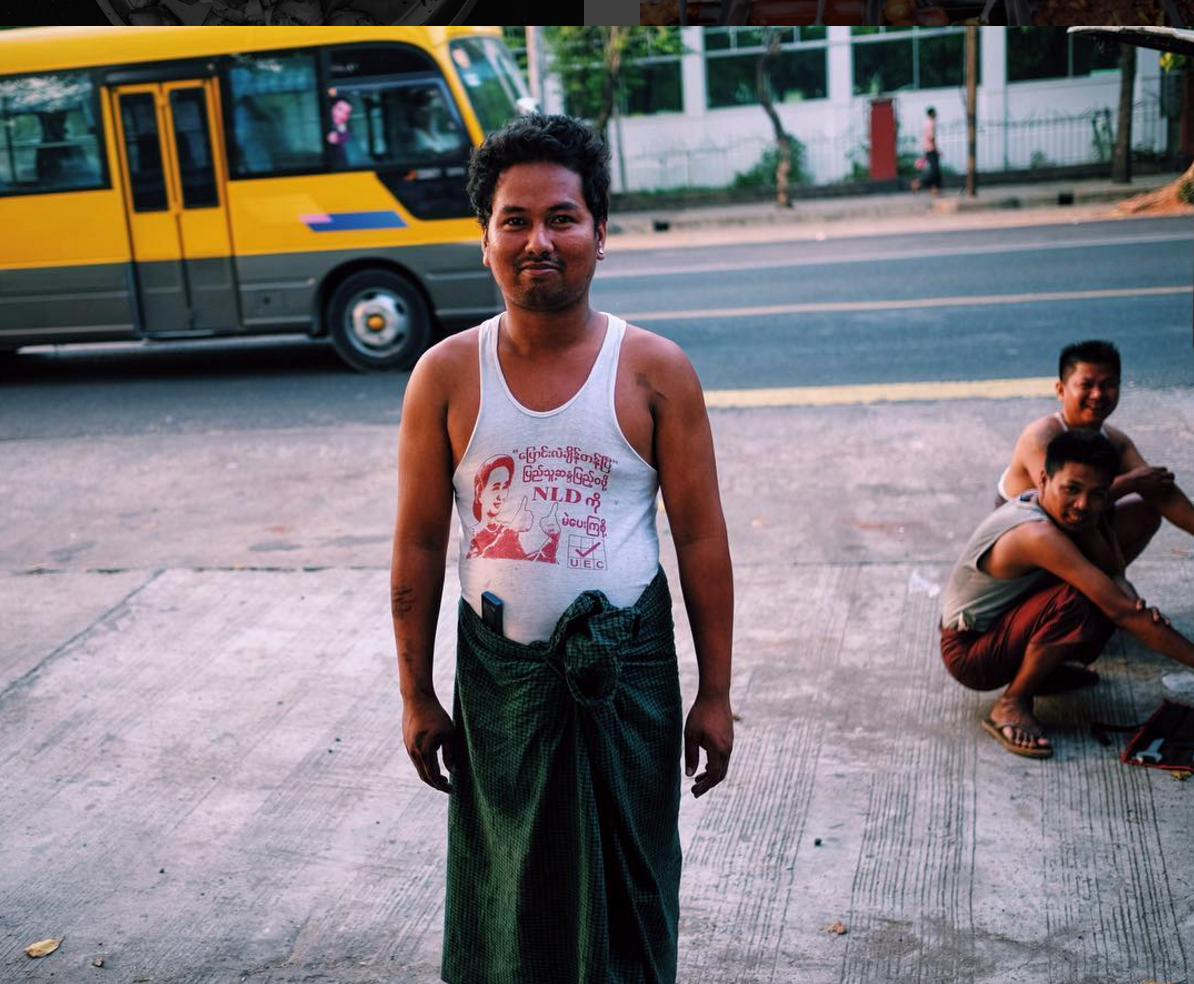  Proudly wearing a NLD tank printed with Aung San Suu Kyi's face in Yangon months after Myanmar's first democratic election in 2015 