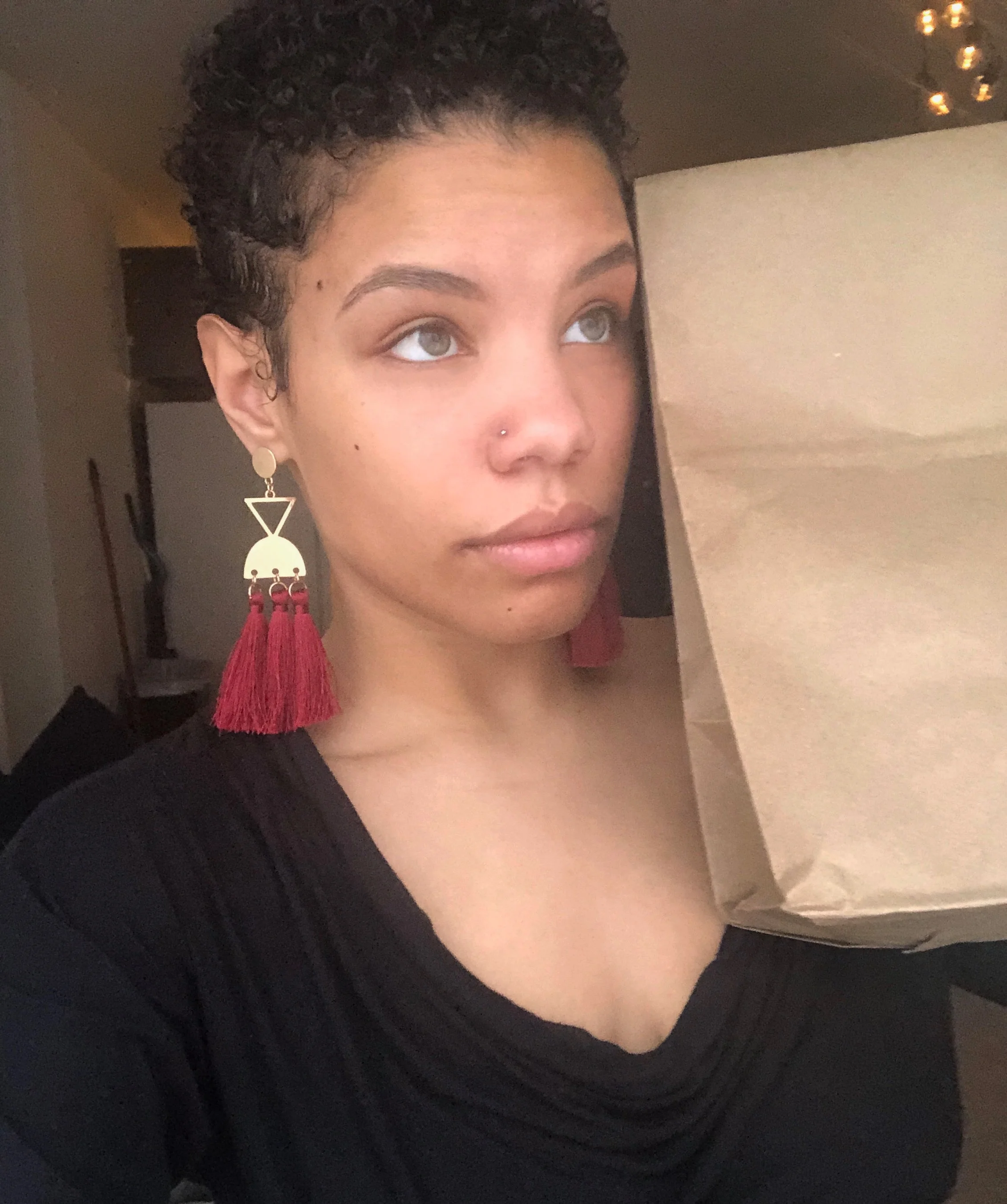 Paper Bag Test— required people of color to measure their skin tone against the color of a paper bag to gain access. Skin tones that were lighter than the paper bag where granted special privileges and rights like admissions in to churches, universities, organizations, night clubs, and bars. (Yes, this is me! I’m a weirdo doing a paper bag test.