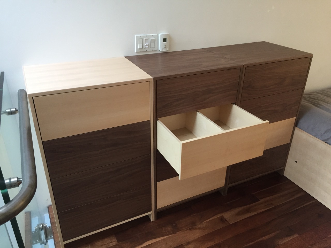 Drawers feature push to open under mount hardware. Upper drawers have dividers to keep stuff organized