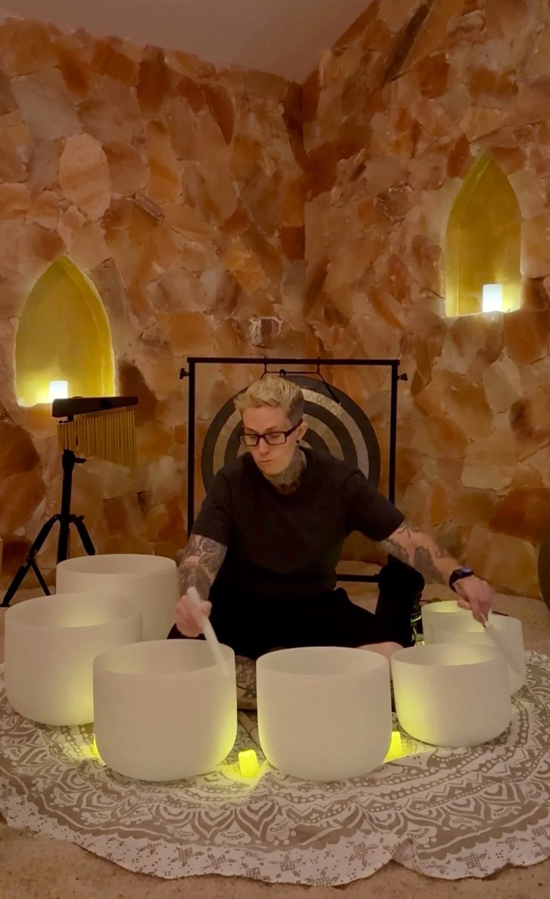 Ash Shea, certified sound healer playing crystal bowls in a salt cave at Sault Haus at Rose Center in hopewell NJ..