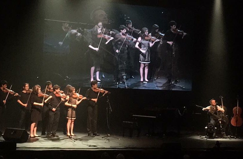 CSS Students performing with The Piano Guys