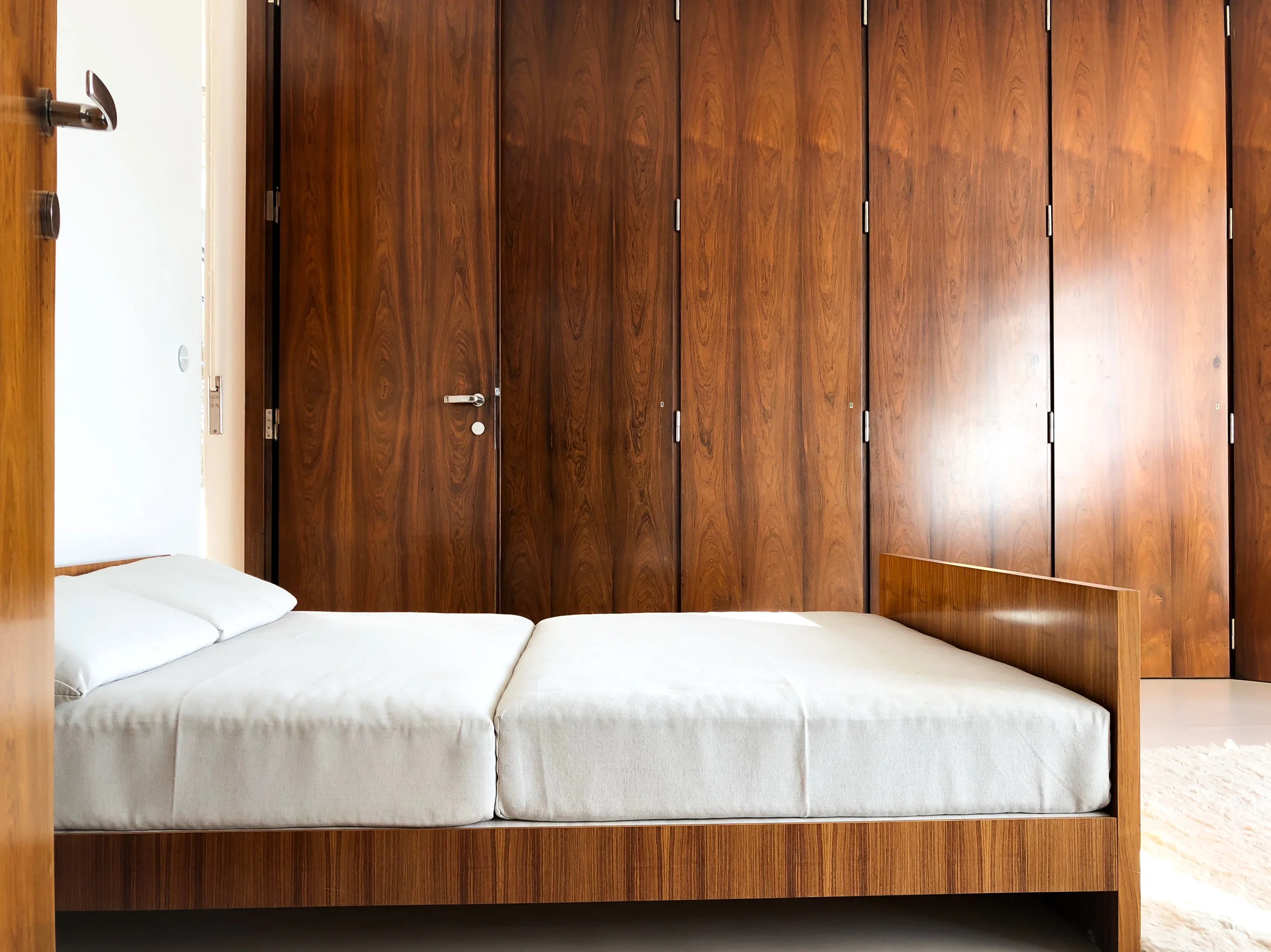 grete tugendhat's bedroom with built-in closets, rosewood veneer