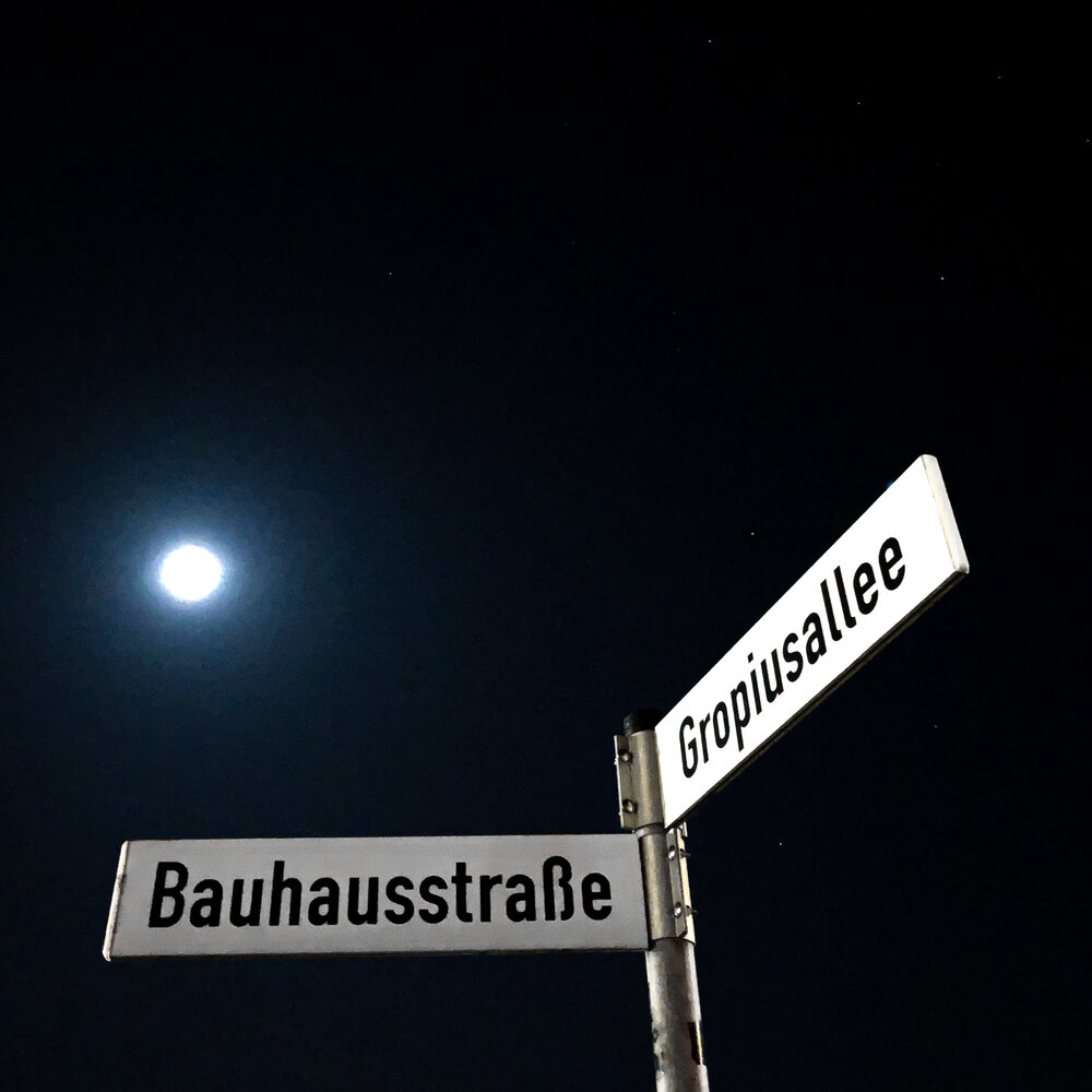 Arriving at Bauhaus Building, street signs named for Bauhaus and Walter Gropius.