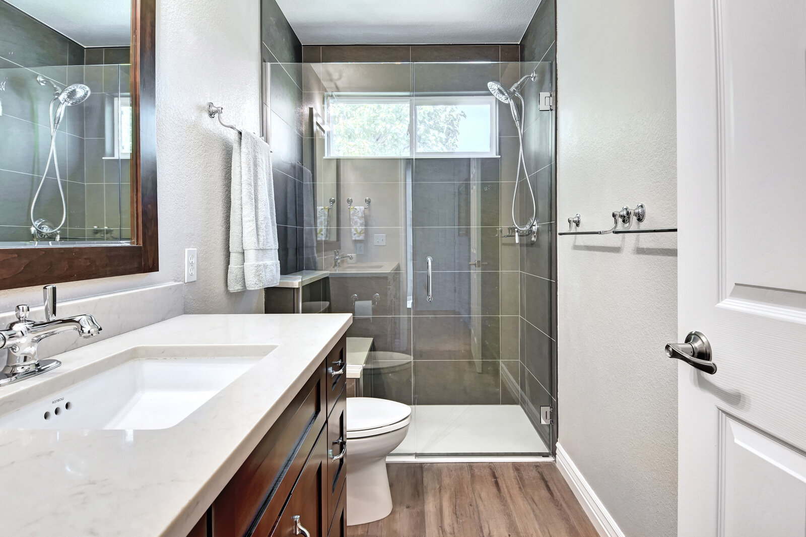 Small Guest Bathroom With White Vanity