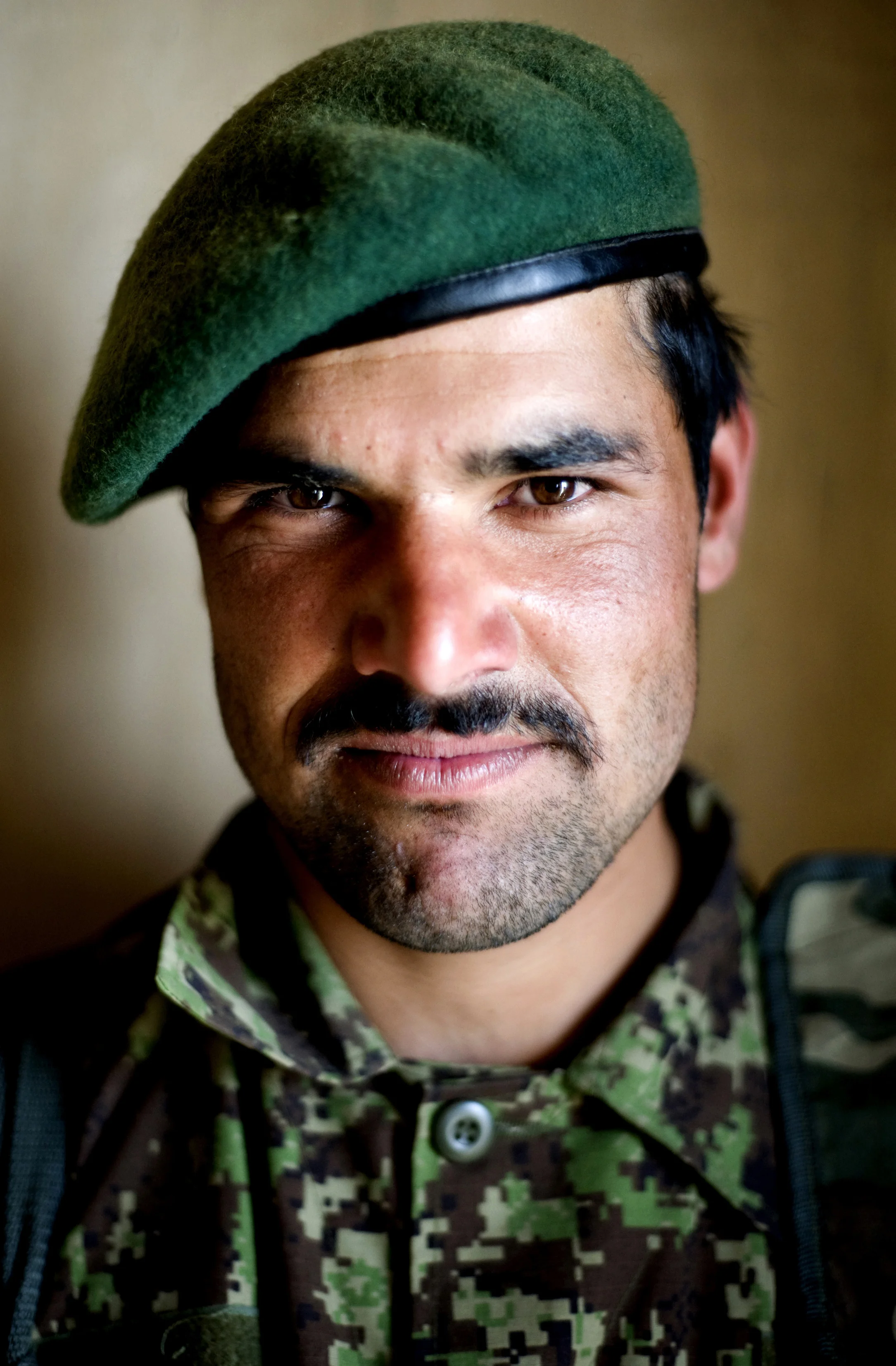 Fazel Khan, an Afghan soldier stationed at Camp Grizzly, Shinkay district, Zabul province. March 2010.