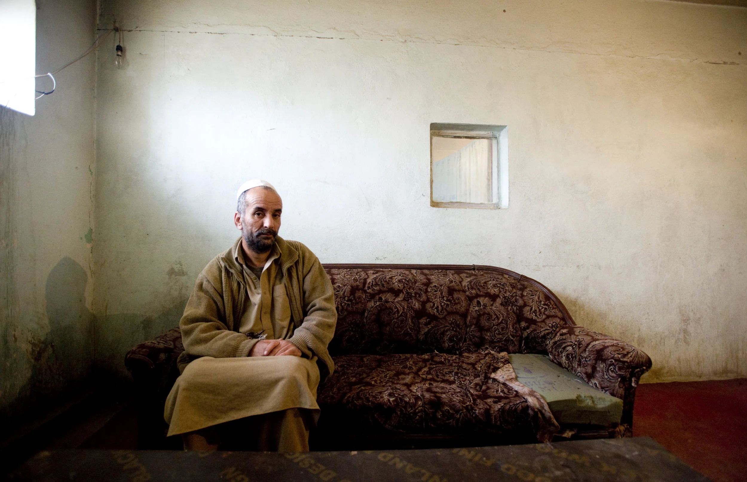 Commander Azizullah Arghandewal. Detained in Pul-e Charkhi jail, Kabul, he was accused of organising a July 2008 suicide attack on the Indian Embassy, which killed at least 58 people. "What's my crime?" he said. "All the crimes are with those soldiers who came here and made me a criminal." March 2011.