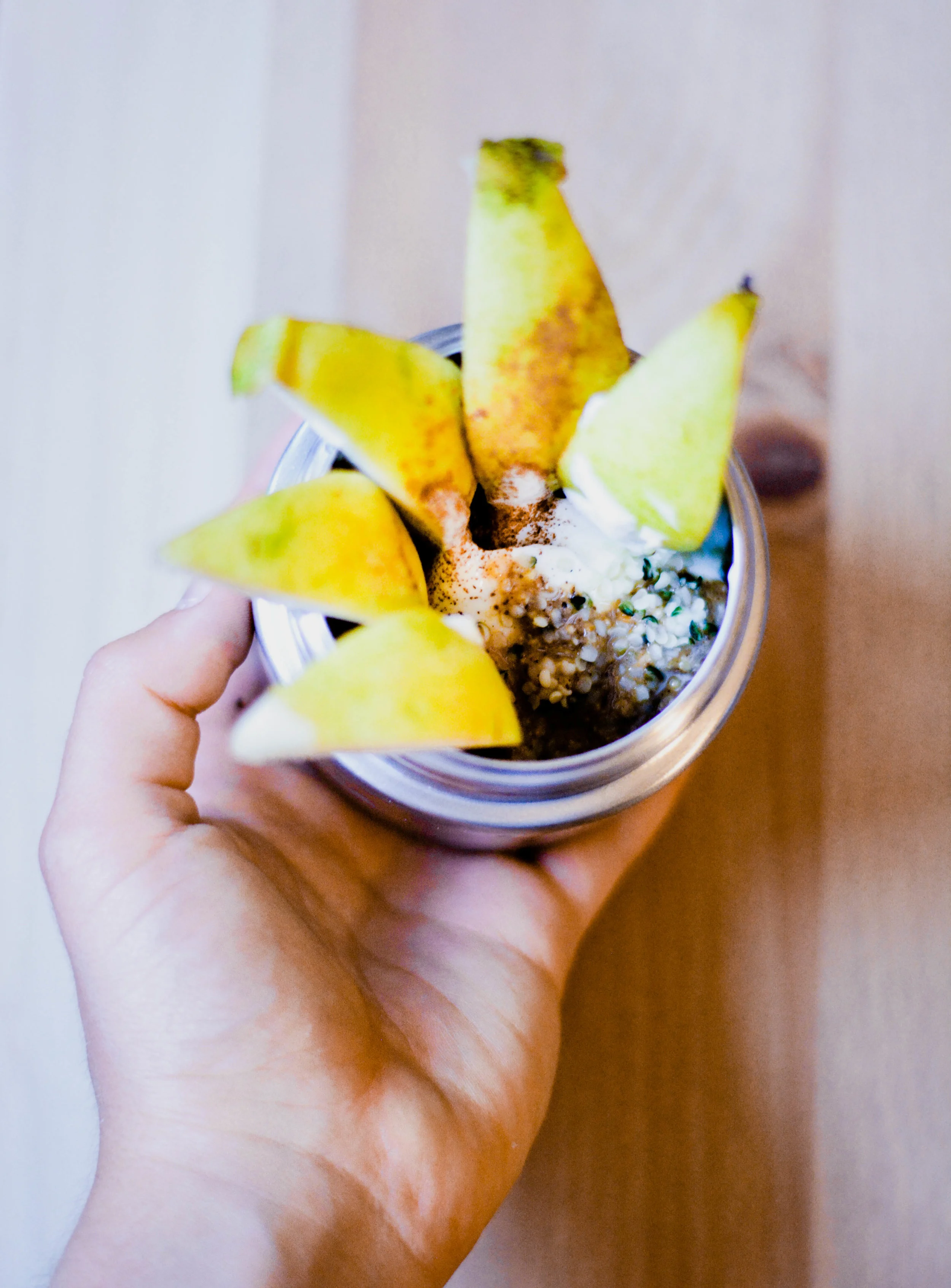 Whole milk yogurt with almond butter, pear, and hemp seeds.