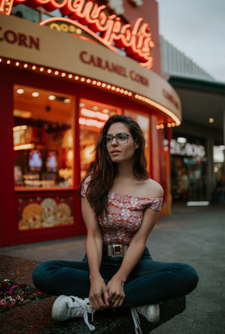 danielle cross leg.png
