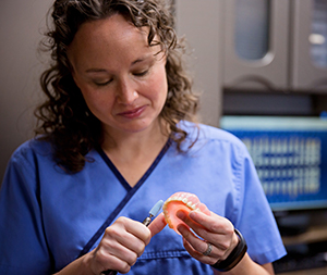 Dr. Amy working on a new denture. Photos by Andrea Smyth Photography