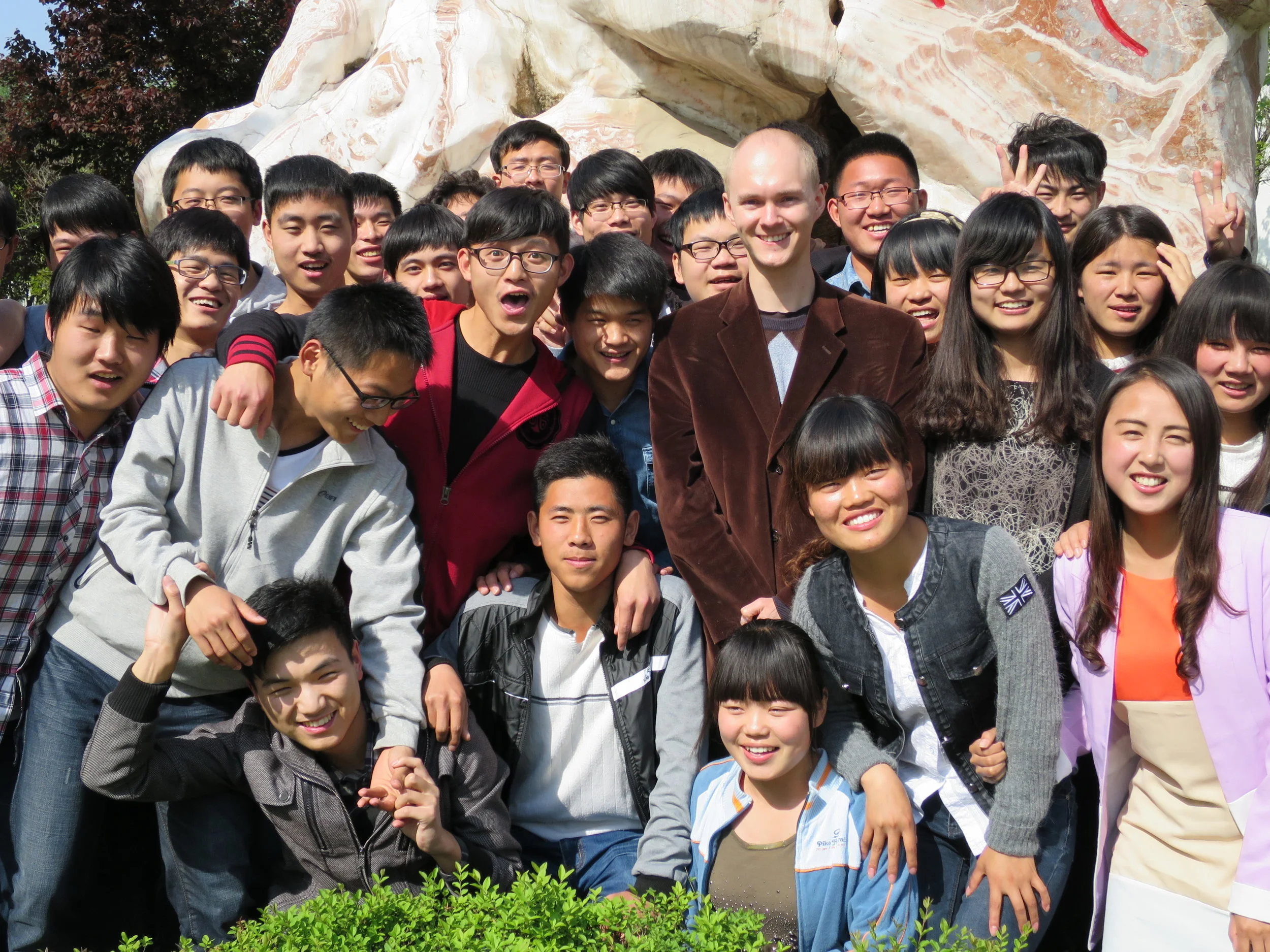 ESL Teacher with students.jpg