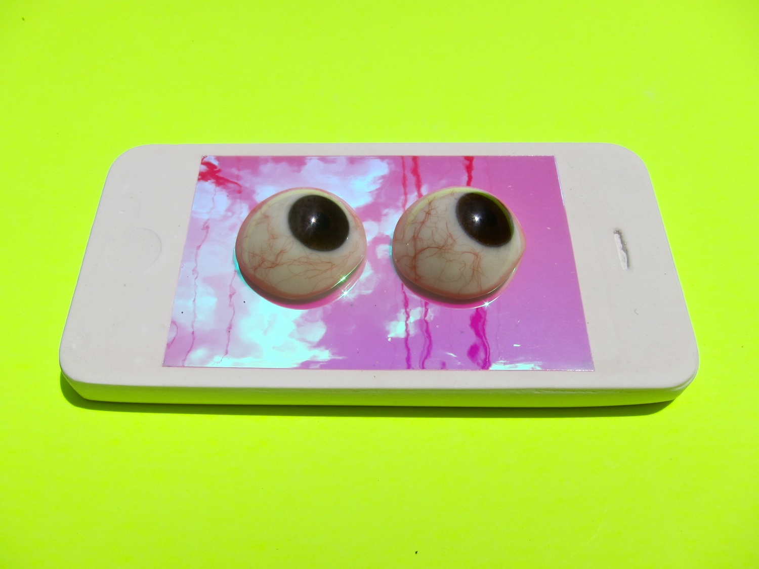   we see you watching us  (2017) cast hydrocal, dichroic film, prosthetic eyeballs 