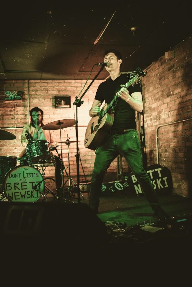 Two men on a stage. Photo: Sweet Chucky B