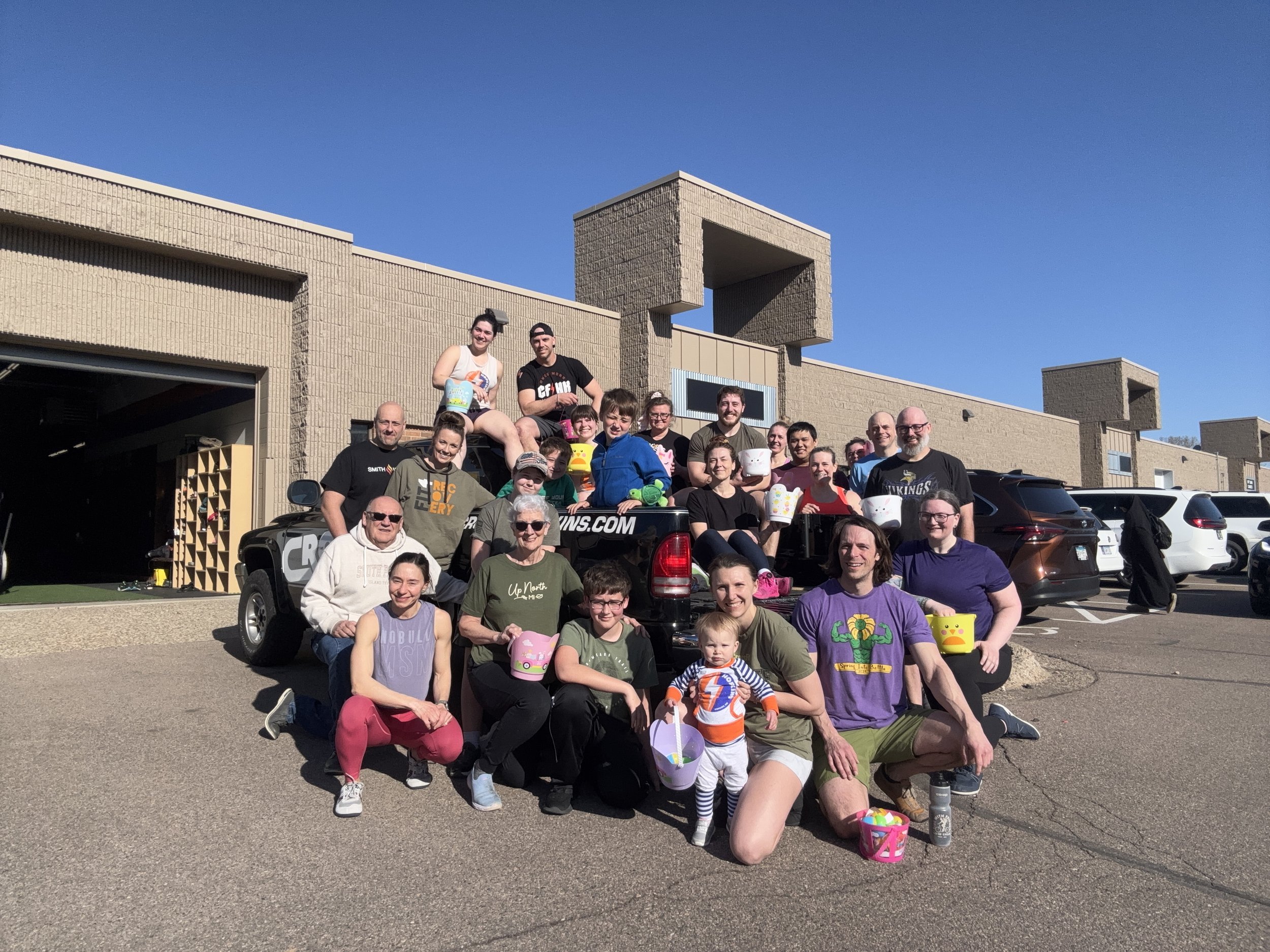 Group photo of members at CrossFit Hopkins after doing an Easter egg hunt themed workout