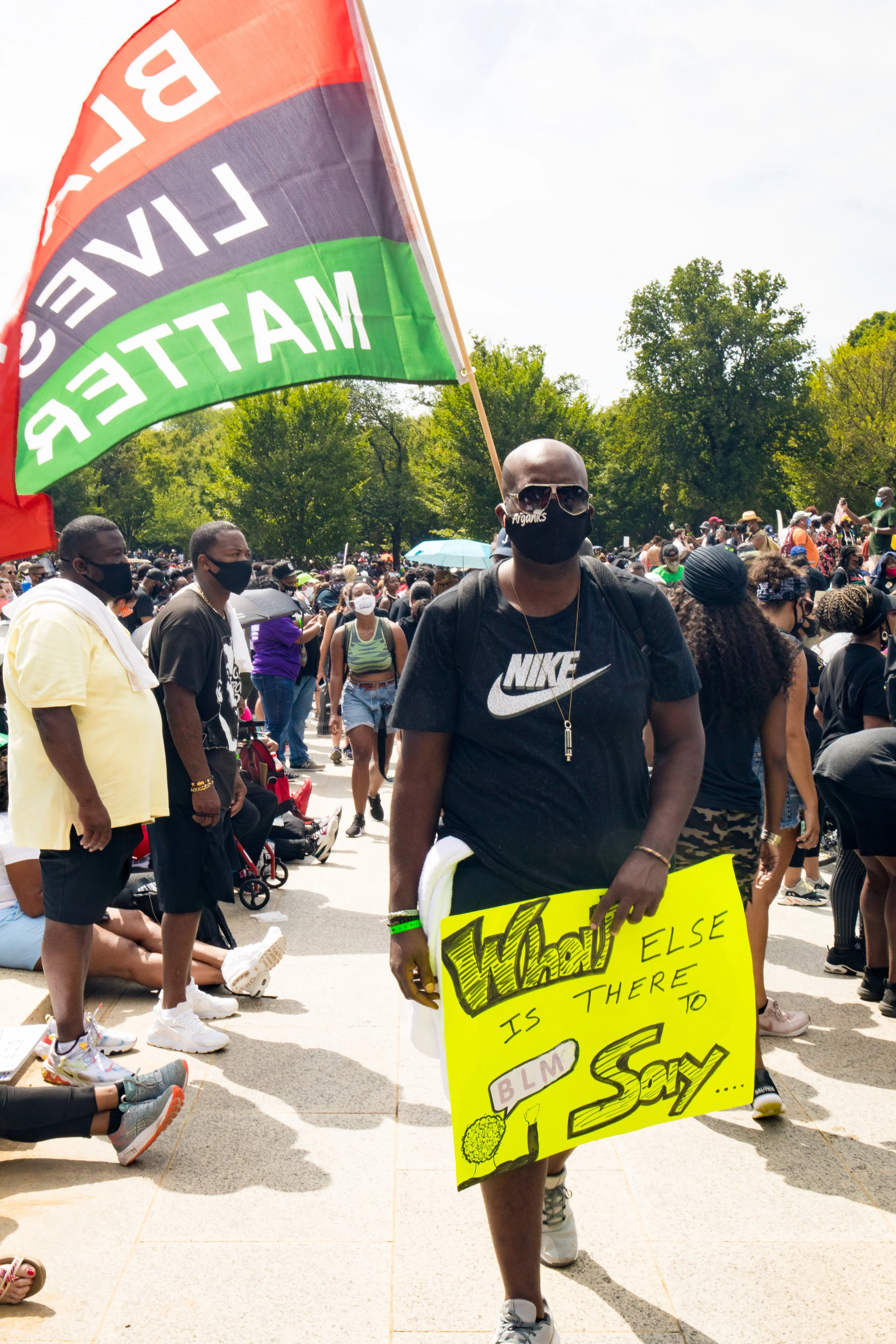 blackLivesMatterFlag_ManWalk.jpg