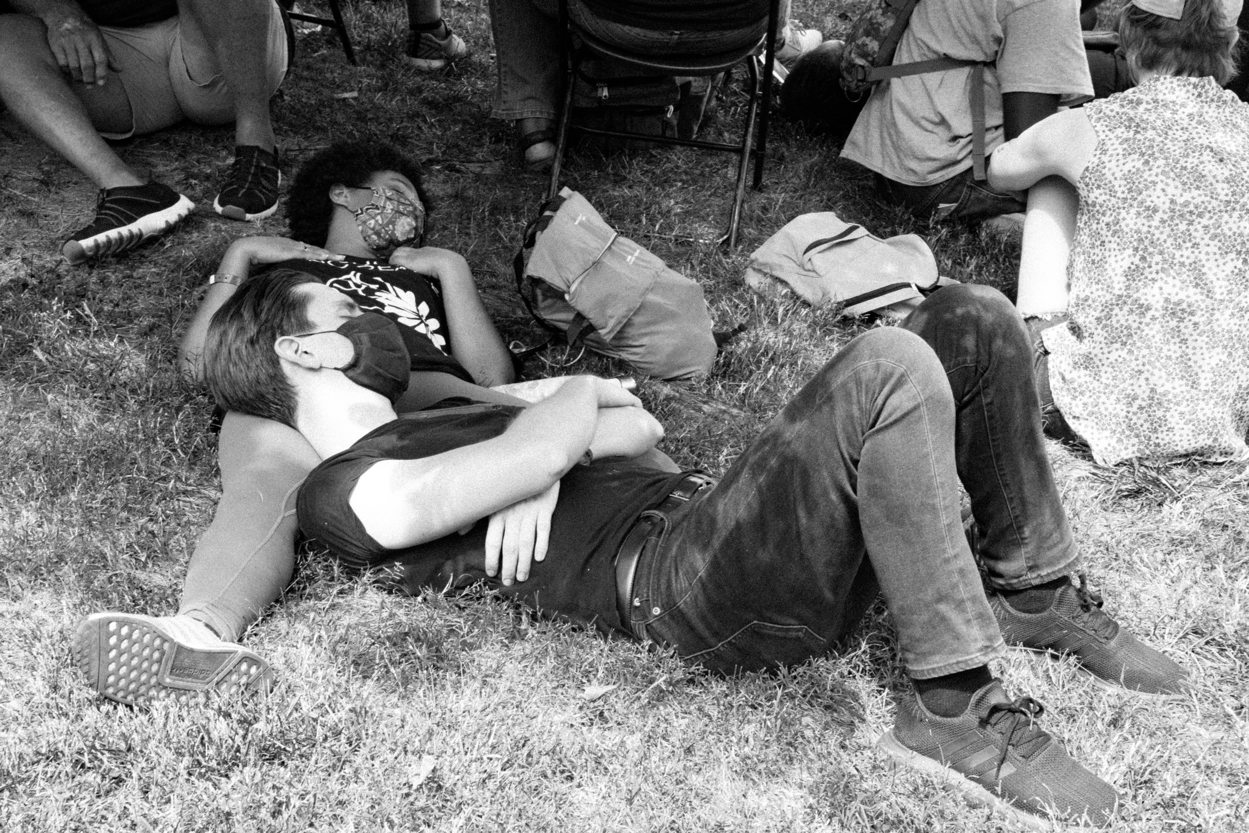 coupleSleepingOnGrass.jpg